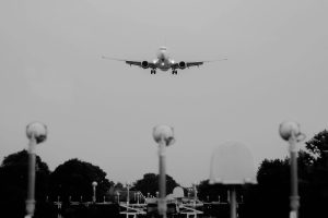 Plane on approach for touch down over sensor field, front view